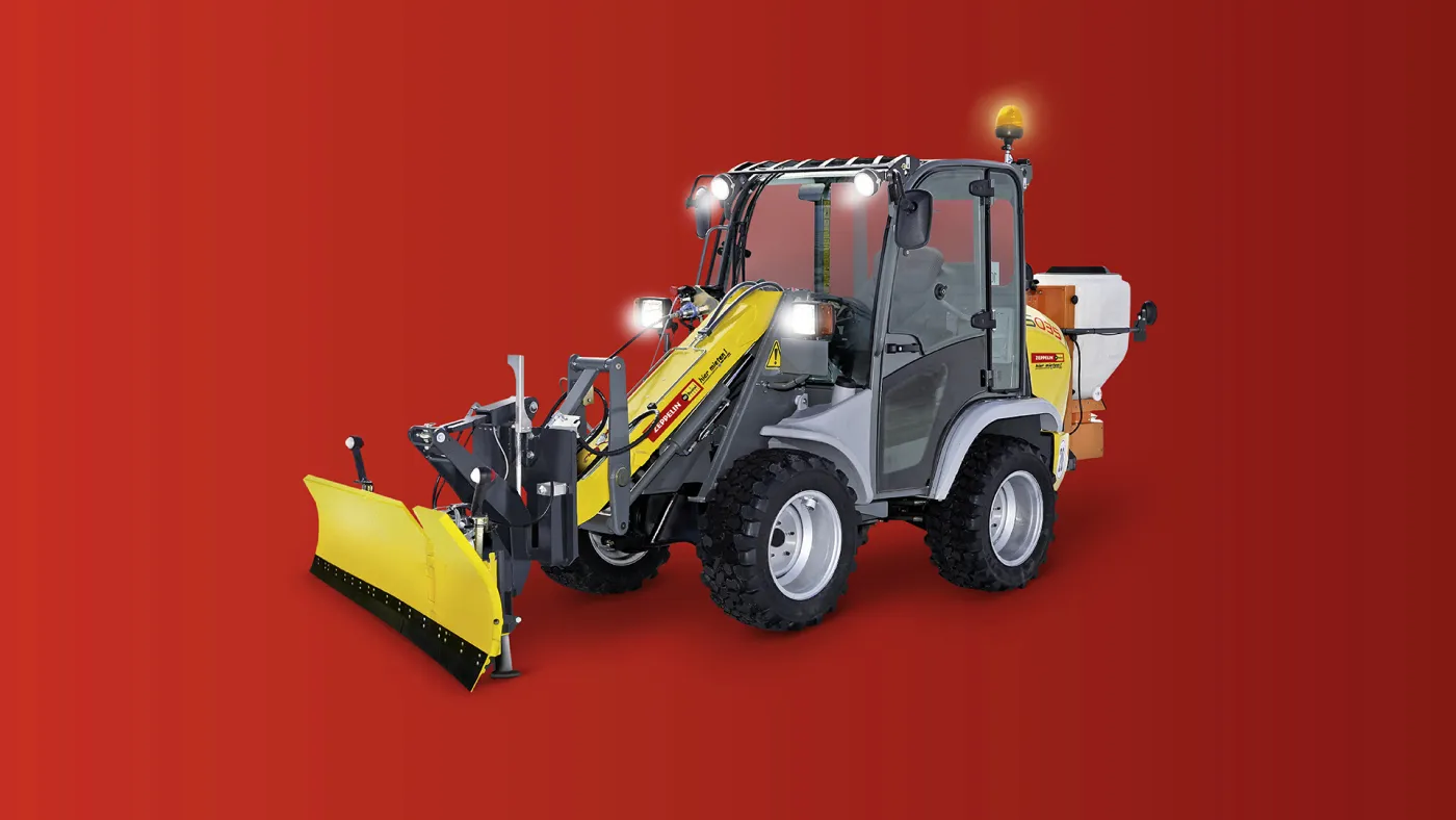 Winterdienst-Set aus Kramer 5035, E-Streuer und Schneeräumschild 